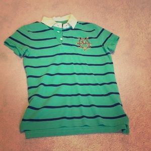Polo shirt with Ralph Lauren logo.